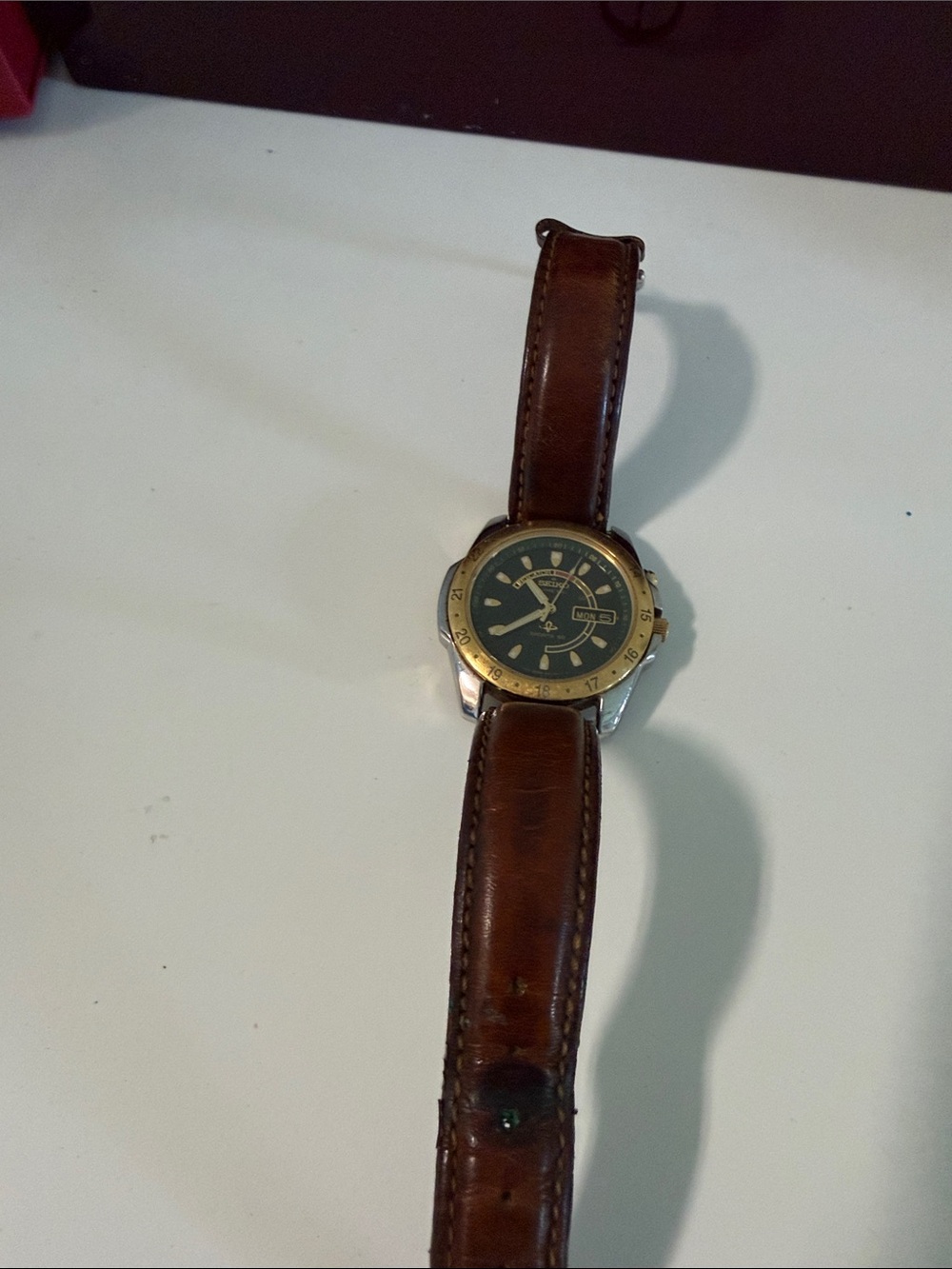 Seiko Men's Watch with Brown Leather Strap and Gold Bezel
